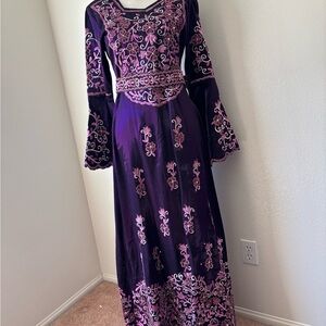 Elegant Long Sleeve Purple Embroidered Dress hijabs were 
Palestinian dress